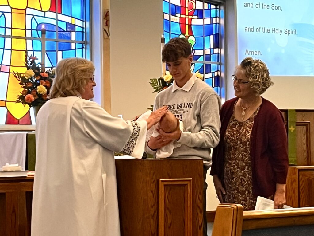 A photo of a baptism in progress